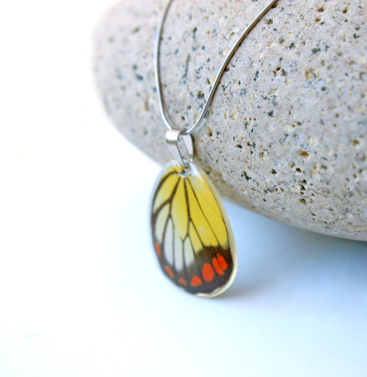 Painted jezebel wing necklace, alternate view