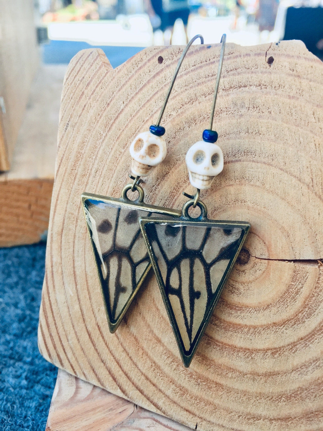 Clear Butterfly Wing Skull Earrings