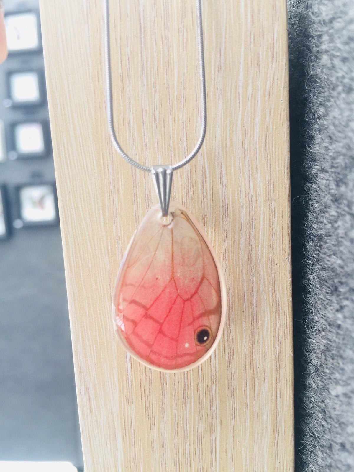 Blushing Phantom wing necklace, detail view