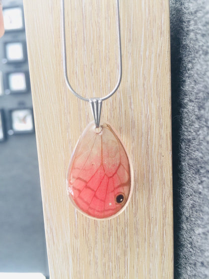 Blushing Phantom wing necklace, detail view