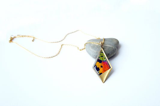 Real Sunset Moth hindwing in a kite pendant necklace