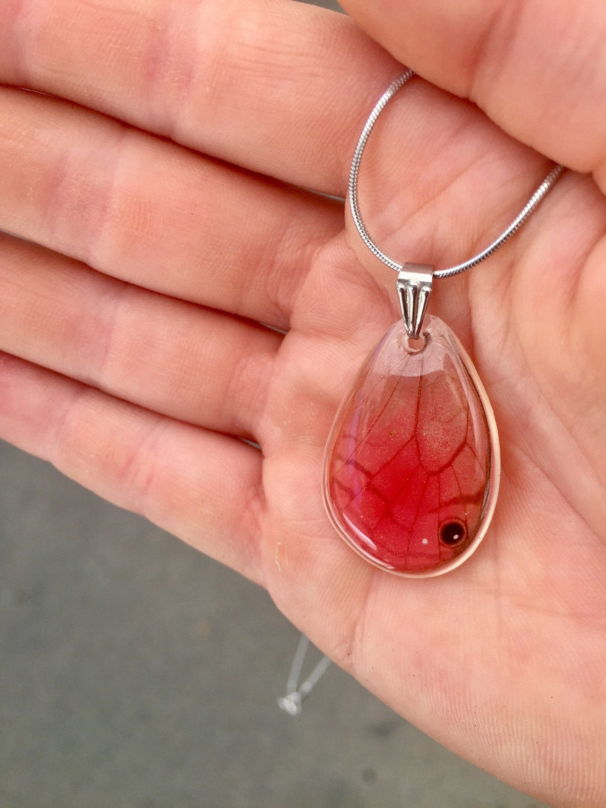 Blushing Phantom wing necklace, alternate view